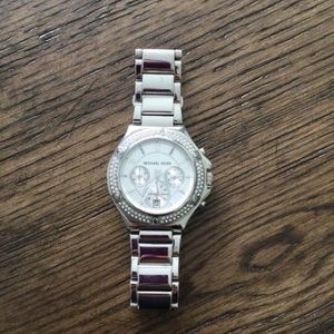 Michael Kors silver watch (woman). Never worn!